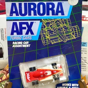 TOMY Aurora AFX Turbo Slot Car #2 electric racing 1986 No. 8635 Packaging Warped. New Old Stock. ACCEPLTABLE Cond. Vtg.