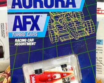 TOMY Aurora AFX Turbo Slot Car #2 electric racing 1986 No. 8635 Packaging Warped. New Old Stock. ACCEPLTABLE Cond. Vtg.