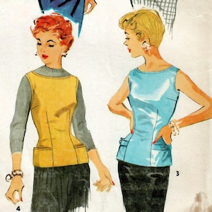 May include: Simplicity sewing pattern number 1228, size 14, bust 32, 35c piece, printed on each pattern. The pattern shows three different sleeveless tops with a V-neckline. The tops are in different colors and patterns, including striped, red, and blue.