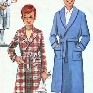 May include: McCall's printed pattern for a boy's robe. The pattern is for size 8 and costs 50 cents. The pattern shows three boys wearing different robes. One robe is white, one is blue, and one is red and black plaid.