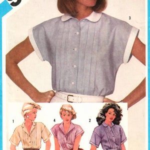 Puede incluir: Un patrón de costura para una blusa con cuello y mangas cortas. El patrón es para la talla 14 y es del patrón Simplicity número 6410. El patrón cuesta 3,75 $.