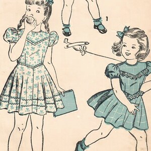 May include: A vintage sewing pattern for a girl's dress. The pattern is for size 3, with a 22 inch breast measurement. The pattern is called "Advance" and the number is 4702. The pattern shows three different styles of dresses, all with a blue and white color scheme.