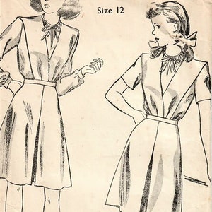 May include: A vintage Du Barry sewing pattern with two dress illustrations. The pattern shows a dress design with a V-neck, short sleeves, and a belted waist. The text includes "5772 Size 12" and "Made in England".