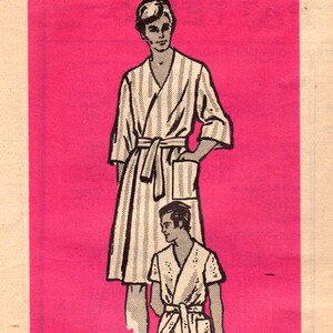May include: A printed sewing pattern for a robe. The pattern is for size small and has a number 4903 printed on it.