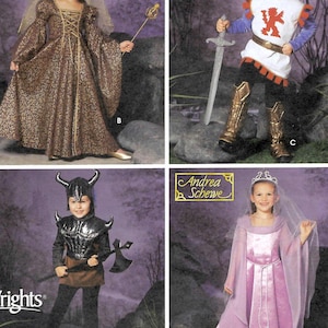 May include: A sewing pattern collection featuring four costumes: a brown patterned medieval gown with a veil, a white tunic with a red lion emblem and sword, a dark horned warrior outfit with an axe, and a light purple gown with a tiara and veil.