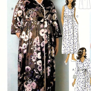 May include: A floor-length robe featuring a dark brown base with a floral pattern in shades of purple, white, and light pink. The robe has three-quarter length sleeves, a wrap-style front with a tie waist, and light pink trim along the edges.
