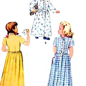 May include: Vintage illustration of three children's dresses. One dress is yellow, another is white with a floral pattern, and the third is blue and white plaid. The dresses have button closures and long sleeves or short sleeves.