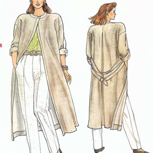 May include: A fashion illustration showing a long, beige, open-front duster coat with a single button closure, worn over a light green top and white trousers. The back view displays a belted waist detail and a center vent on the long coat.