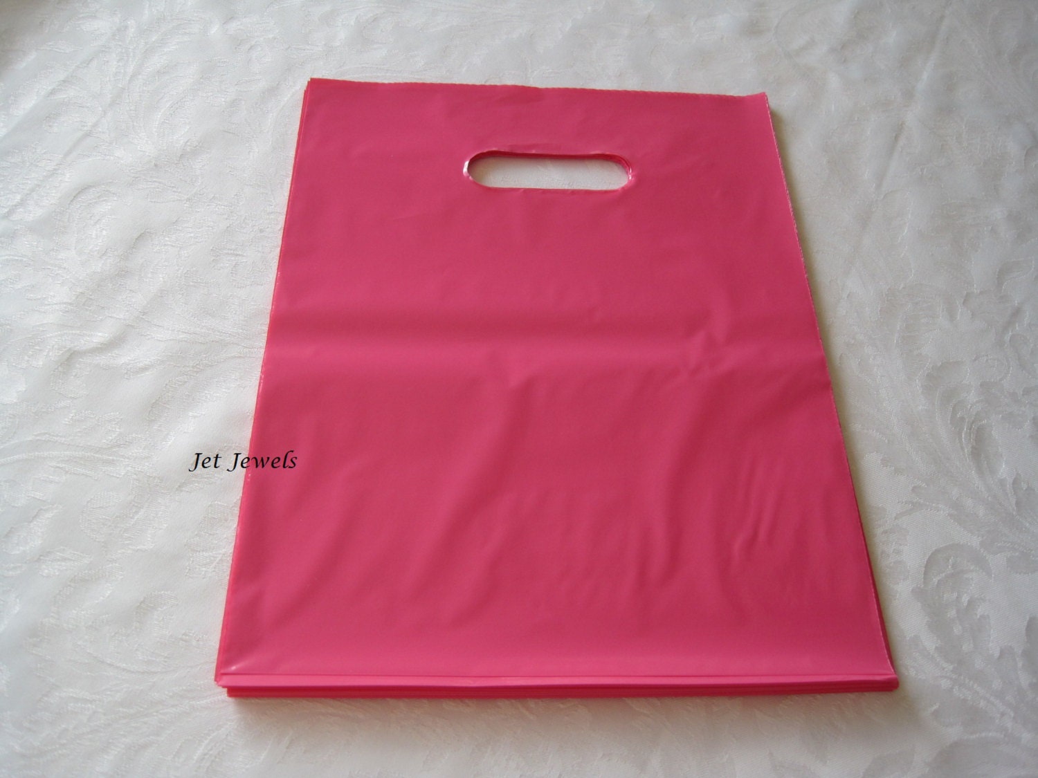 Pink plastic online grocery bags