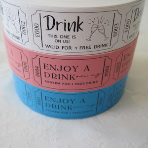 May include: Three stacked paper drink tickets with a white, pink, and blue design. The top ticket says "Drink This one is on us! Valid for 1 free drink". The middle ticket says "Enjoy a Drink on us. Redeem for 1 free drink". The bottom ticket says "Enjoy a Drink on us. Redeem for 1 free drink".