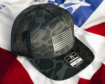 Gorra trucker con parche de la bandera estadounidense: Acrílico metalizado, cierre ajustable Richardson.