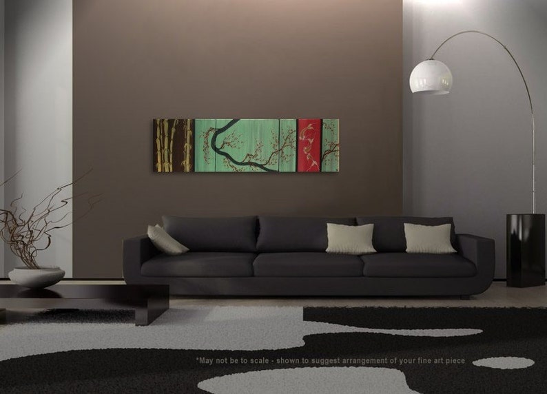 May include: A modern living room interior design with a black sofa and a large abstract painting on the wall. The painting is a multi-panel piece with a green, brown, and red color scheme. The painting features a stylized tree with branches and leaves.