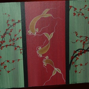 May include: A painting of three gold fish swimming in a red pond, with a green background featuring black branches with red blossoms.