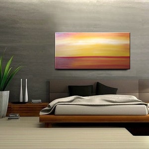 May include: A modern bedroom with a wooden platform bed, a large abstract painting above the headboard, and a potted plant in the corner.