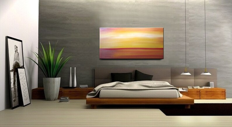 May include: A modern bedroom with a wooden platform bed, a large abstract painting above the headboard, and a potted plant in the corner.