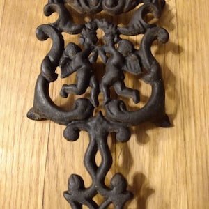 Vintage Trivet - Cast Iron Footed Angel Trivet - J H Wilton - Cherub Angel Filigree Design