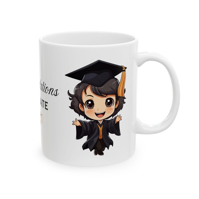May include: White ceramic mug with a black and yellow cartoon graduate wearing a cap and gown. The text "Congratulations Graduate" is printed on the mug.
