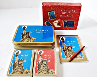 Statue of liberty playing card decks, centennial 1886-1986 cards are sealed score pad tin box play Bridge Poker Canasta Euchre Red Blue