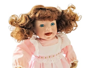 Julie 14 inches tall from Ashton Drake Galleries Porcelain Doll by Kathy Hippensteel 1993, Limited Edition, original pink dress, red hair