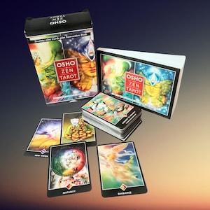 May include: A deck of Osho Zen Tarot cards featuring a box, an instruction book, and several individual cards displayed on a surface. The cards and packaging display colourful, artistic illustrations and the text Osho Zen Tarot.