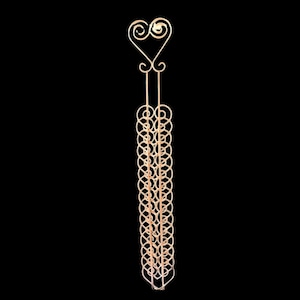 May include: A tall, slender, light-coloured metal wire display stand featuring a vertical column of interconnected circular loops. The top of the structure is finished with a decorative heart-shaped wire element, providing a symmetrical design.