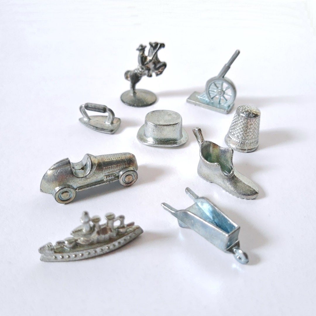 Monopoly Game Pieces Metal Pewter Tokens Nine Pieces Iron, Horse and Rider, Shoe, Cannon, Race