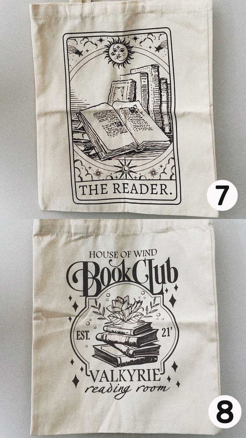 May include: Two beige canvas tote bags with black graphic designs. One features an open book and the text "THE READER." The other says "HOUSE OF WIND Book Club" and "VALKYRIE reading room."