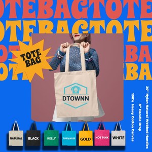 a woman holding a tote bag in front of a blue background