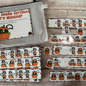 May include: Educational game featuring skunks and pumpkins. The game includes cards with patterns and the text "PUMPKIN SKUNK PATTERNS WHAT'S MISSING?" The game is designed to help children identify missing elements in an AAB pattern.