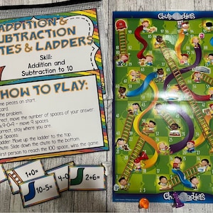 PDFバージョン シュート＆ラダー 10までの足し算、引き算 算数ファイルフォルダー ゲームセンター 幼稚園1年生 タスクボックス ビジーバッグ