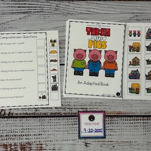 May include: Educational materials for children featuring "The Three Little Pigs." Includes an adapted book with illustrations of pigs and houses, comprehension questions, and a name tag with the date.