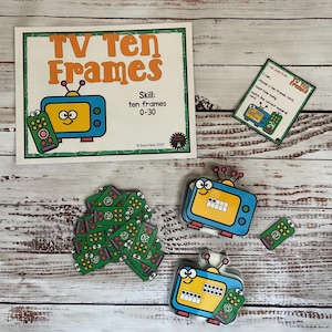 May include: Educational game set featuring "TV Ten Frames" with a cartoon TV design. Includes cards with numbers and ten-frame representations, a guide card, and a title card. The skill level is ten frames 0-30.