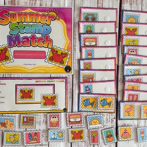 May include: A Summer Stamp Match educational activity set featuring a large title card, an instruction card, and multiple rectangular cards with Velcro dots. Each card displays colorful summer-themed illustrations like crabs, suns, and ice cream.