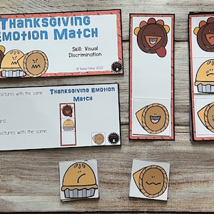 May include: Thanksgiving Emotion Match game with turkey and pie illustrations. The game includes cards with matching emotions, designed for visual discrimination skills. The game features the text "Thanksgiving Emotion Match" and "Skill: Visual Discrimination".