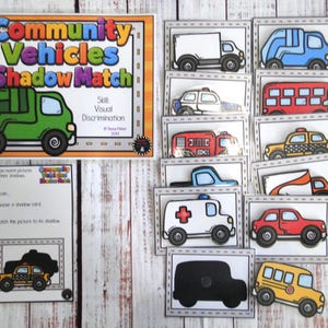 May include: A Community Vehicles Shadow Match educational activity set featuring a title card, instruction card, and multiple rectangular cards displaying colorful illustrations of various vehicles alongside their corresponding black shadow silhouettes.