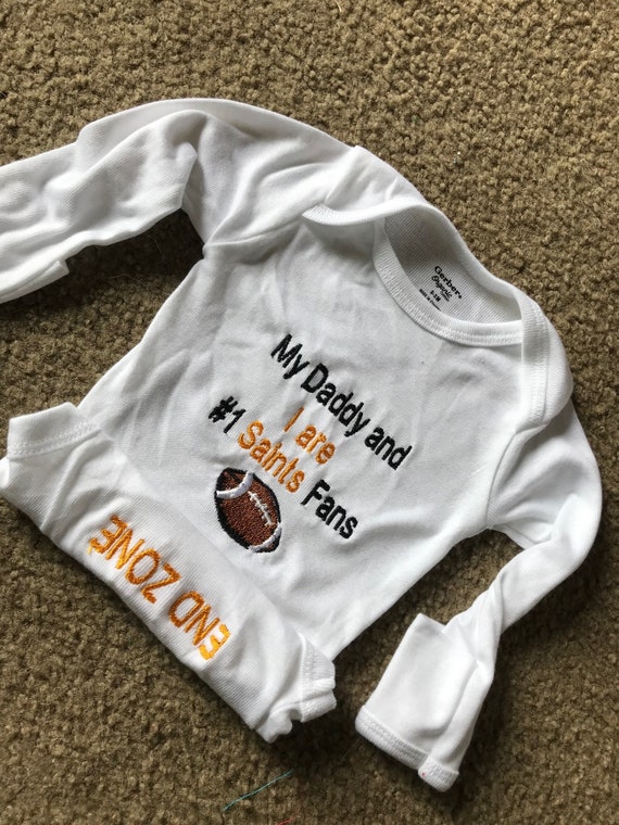 saints baby onesie