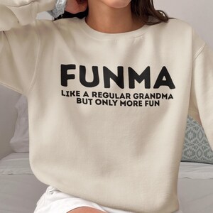 FUNMA Grandma Sweatshirt, Funny Grandma Gift, Like a Regular Grandma but More Fun Crewneck, Cool Nana Birthday Sweater, New Grandma Pullover