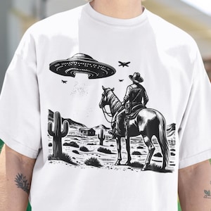 Chemise unisexe western ovni, t-shirt rétro, t-shirt cowboy vintage, t-shirt de rodéo, chemise Far West, t-shirt western surdimensionné, cadeau pour lui et elle