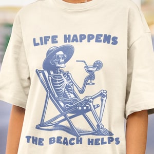 Life Happens The Beach Helps T-Shirt, Funny Skeleton Beach Shirt, Summer Vacation Tee, Vacation Gift, Cute Summer Tee, Beach Therapy Shirt