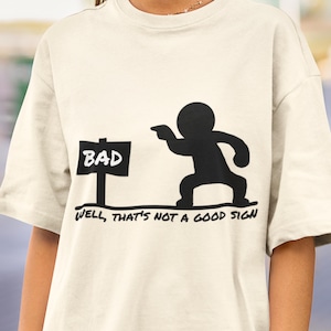 Well That’s Not a Good Sign T-Shirt, Funny Sarcastic Graphic Tee, Humor Shirt, Bad Day Gift, Gag Gift, Ironic Street Sign Tee, Novelty Joke