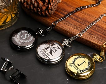 May include: Three silver and gold pocket watches with chains. The watches are engraved with the letters S, K, and J, and the words "Simon", "Kevin", "Best Man", and "17.09.2024".