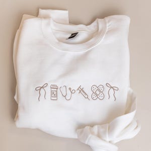 Nurse Icon crewneck| Nursing icons sweatshirt | Embroidered Sweatshirt | gifts for nurses