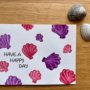 Sommerliche Postkarte mit Muscheln "Have a happy day"