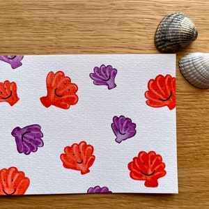 Sommerliche Postkarte mit Muscheln