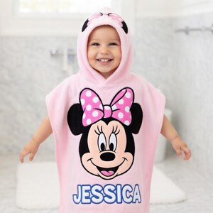 May include: A rustic wooden sign with the text "Welcome to our home" in white lettering. The sign features a distressed finish and a simple, inviting design, perfect for entryway decor.