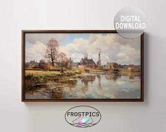 May include: A painting of a village scene with a river in the foreground. The river is reflecting the sky and clouds. There are buildings on the far side of the river, and trees on the near side. The painting is in a brown frame.