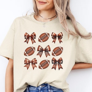 Coquette Football T-Shirt, Football Mom Shirt, Sports Mom Tee, Gameday Football Shirt, Football Shirt, Cute Football Tee, Football Bow Shirt