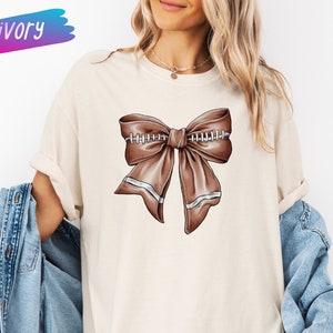 Comfort Colors Football Bow T-Shirt, Football with Coquette Bow Shirt, Football Mom T-Shirt, Football Shirt, Cute Football Season T-Shirt