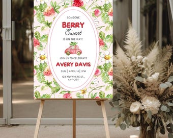 May include: A pink and green floral sign on a wooden easel. The sign has the text "BERRY Sweet" in a white oval, with a red car graphic. The sign is for Avery Davis's celebration, with the date and time.