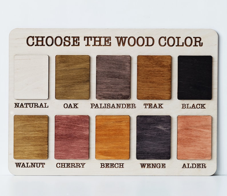 May include: A wooden color chart with the text "CHOOSE THE WOOD COLOR" at the top. The chart displays ten rectangular wood samples in various colors, including natural, oak, palisander, teak, and black.